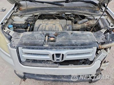 Zdjęcie 12 z 13 samochodu: 2006 HONDA PILOT EX VIN:2HKYF185X6H502338 - miniatura