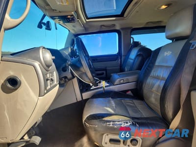 Zdjęcie 7 z 13 samochodu: 2004 HUMMER H2 VIN:5GRGN23U64H117887 - miniatura