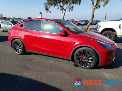 Czwarte zdjęcie samochodu z boku: 2022 TESLA MODEL Y VIN:7SAYGDEF5NF486819 - miniatura
