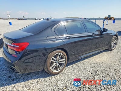 Trzecie zdjęcie samochodu z tyłu: 2019 BMW 750 XI VIN:WBA7F2C5XKB240502 - miniatura