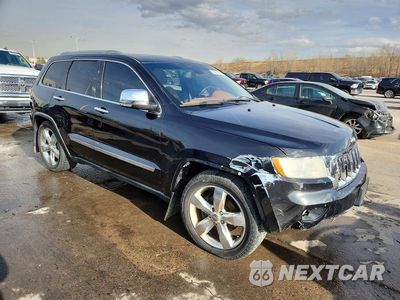 Czwarte zdjęcie samochodu z boku: 2012 JEEP GRAND CHEROKEE OVERLAND VIN:1C4RJFCG1CC169656 - miniatura