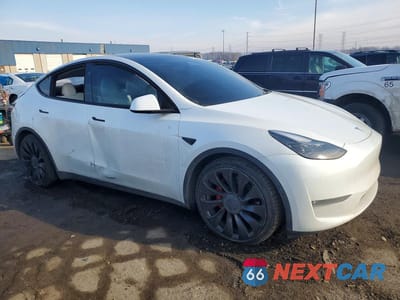 Czwarte zdjęcie samochodu z boku: 2023 TESLA MODEL Y VIN:7SAYGDEF7PF936795 - miniatura