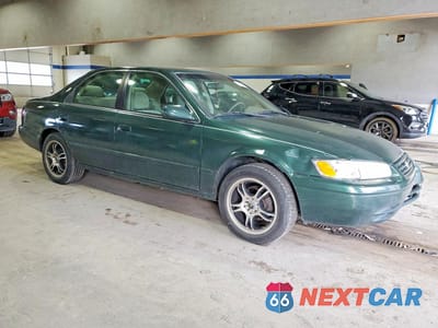 Czwarte zdjęcie samochodu z boku: 1999 TOYOTA CAMRY CE VIN:4T1BG22K5XU413321 - miniatura