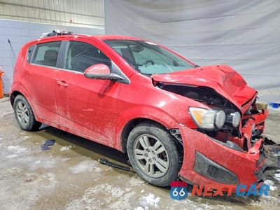 Czwarte zdjęcie samochodu z boku: 2014 CHEVROLET SONIC LT VIN:1G1JC6SB7E4163010 - miniatura