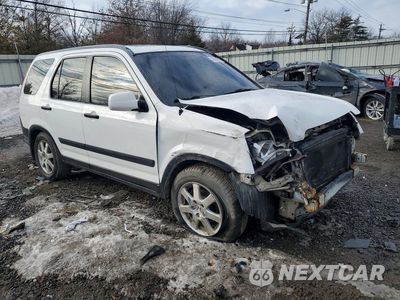 Czwarte zdjęcie samochodu z boku: 2004 HONDA CR-V EX VIN:SHSRD78874U246140 - miniatura
