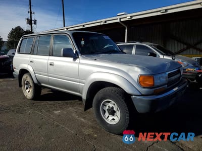Czwarte zdjęcie samochodu z boku: 1991 TOYOTA LAND CRUISER FJ80 VIN:JT3FJ80W8M0012496 - miniatura