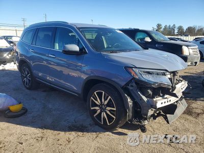 Czwarte zdjęcie samochodu z boku: 2022 HONDA PILOT ELITE VIN:5FNYF6H06NB050936 - miniatura