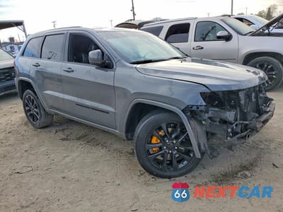 Czwarte zdjęcie samochodu z boku: 2022 JEEP GRAND CHEROKEE LAREDO E VIN:1C4RJEAG9NC155889 - miniatura