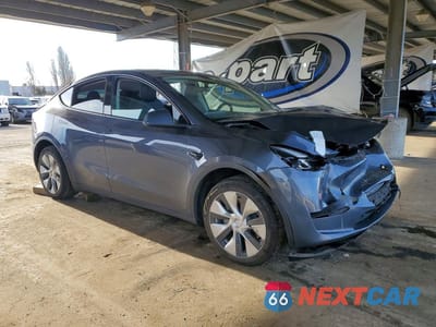 Czwarte zdjęcie samochodu z boku: 2023 TESLA MODEL Y VIN:7SAYGDEE0PF620291 - miniatura