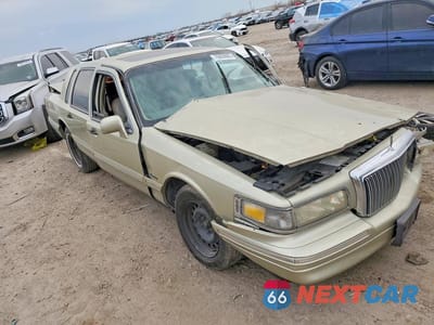 Czwarte zdjęcie samochodu z boku: 1997 LINCOLN TOWN CAR SIGNATURE VIN:1LNLM82W0VY726334 - miniatura