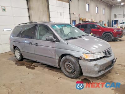 Czwarte zdjęcie samochodu z boku: 2000 HONDA ODYSSEY LX VIN:2HKRL1854YH622698 - miniatura