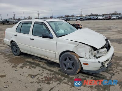 Czwarte zdjęcie samochodu z boku: 1998 VOLKSWAGEN JETTA GL VIN:3VWRA81H7WM209052 - miniatura