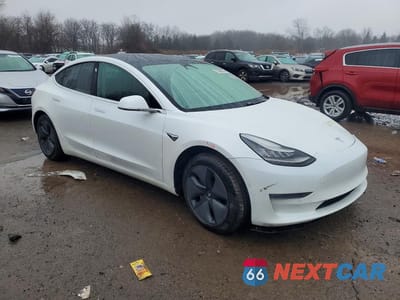 Czwarte zdjęcie samochodu z boku: 2020 TESLA MODEL 3 VIN:5YJ3E1EB6LF744433 - miniatura