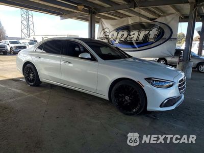 Czwarte zdjęcie samochodu z boku: 2022 MERCEDES BENZ S 500 4MATIC VIN:W1K6G6DB4NA157381 - miniatura