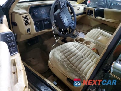 Zdjęcie 8 z 12 samochodu: 1995 JEEP GRAND CHEROKEE LAREDO VIN:1J4GZ58S0SC612881 - miniatura