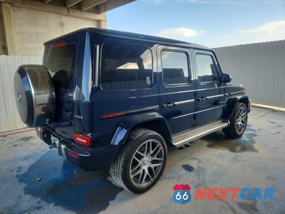 Trzecie zdjęcie samochodu z tyłu: 2023 MERCEDES-BENZ G 63 AMG VIN:W1NYC7HJ1PX477658 - miniatura