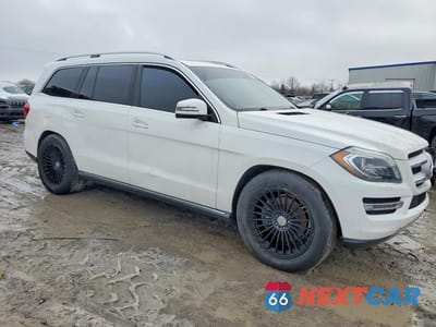 Czwarte zdjęcie samochodu z boku: 2016 MERCEDES-BENZ GL 450 4MATIC VIN:4JGDF6EE0GA644122 - miniatura