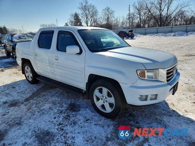Czwarte zdjęcie samochodu z boku: 2014 HONDA RIDGELINE RTL VIN:5FPYK1F54EB001920 - miniatura
