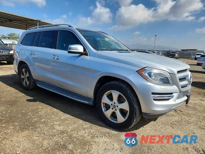 Czwarte zdjęcie samochodu z boku: 2014 MERCEDES-BENZ GL 450 4MATIC VIN:4JGDF7CE2EA269033 - miniatura