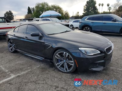 Czwarte zdjęcie samochodu z boku: 2016 BMW M6 GRAN COUPE VIN:WBS6E9C58GGF92655 - miniatura