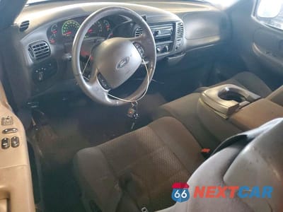 Zdjęcie 8 z 11 samochodu: 2003 FORD F150 VIN:1FTRX17W13NA90074 - miniatura