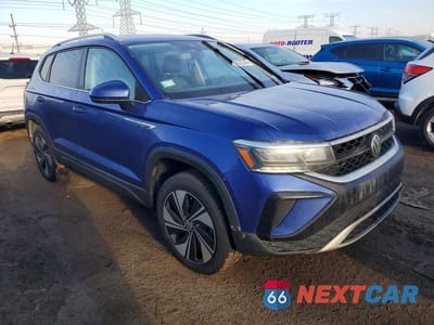 Czwarte zdjęcie samochodu z boku: 2023 VOLKSWAGEN TAOS SE VIN:3VVUX7B29PM370084 - miniatura