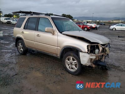 Czwarte zdjęcie samochodu z boku: 2000 HONDA CR-V SE VIN:JHLRD1871YS024166 - miniatura
