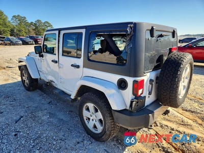 Drugie zdjęcie samochodu z przodu: 2012 JEEP WRANGLER UNLIMITED SAHARA VIN:1C4HJWEG9CL279685 - miniatura
