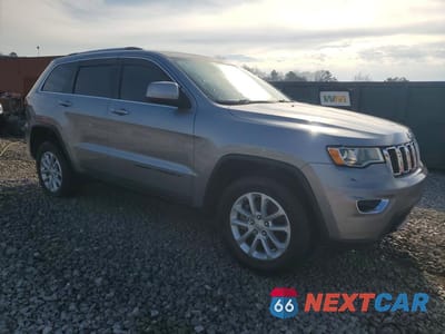 Czwarte zdjęcie samochodu z boku: 2021 JEEP GRAND CHEROKEE LAREDO VIN:1C4RJEAG3MC658123 - miniatura