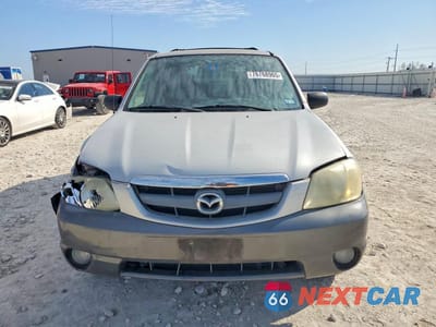 Piąte zdjęcie samochodu w środku: 2003 MAZDA TRIBUTE VIN:4F2CZ06103KM32258 - miniatura