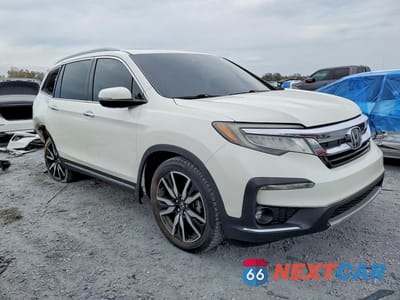 Czwarte zdjęcie samochodu z boku: 2019 HONDA PILOT TOURING VIN:5FNYF5H67KB002002 - miniatura