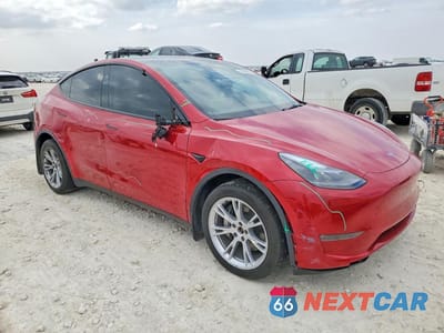 Czwarte zdjęcie samochodu z boku: 2023 TESLA MODEL Y VIN:7SAYGDEE1PA176268 - miniatura