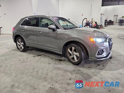 Czwarte zdjęcie samochodu z boku: 2020 AUDI Q3 PREMIUM VIN:WA1AECF38L1034835 - miniatura