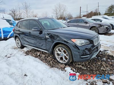 Czwarte zdjęcie samochodu z boku: 2014 BMW X1 XDRIVE35I VIN:WBAVM5C56EVV92641 - miniatura