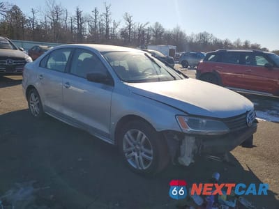 Czwarte zdjęcie samochodu z boku: 2011 VOLKSWAGEN JETTA BASE VIN:3VW1K7AJ2BM305754 - miniatura