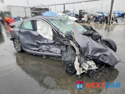 Czwarte zdjęcie samochodu z boku: 2018 HONDA CIVIC EX VIN:2HGFC2F77JH515903 - miniatura