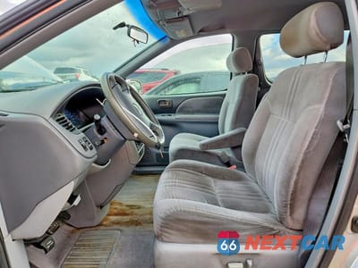 Zdjęcie 7 z 12 samochodu: 2003 TOYOTA SIENNA VIN:4T3ZF13CX3U545558 - miniatura