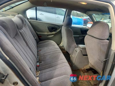 Zdjęcie 10 z 12 samochodu: 2002 CHEVROLET MALIBU VIN:1G1ND52JX2M633042 - miniatura