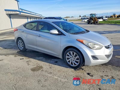 Czwarte zdjęcie samochodu z boku: 2011 HYUNDAI ELANTRA GLS VIN:5NPDH4AE4BH047436 - miniatura