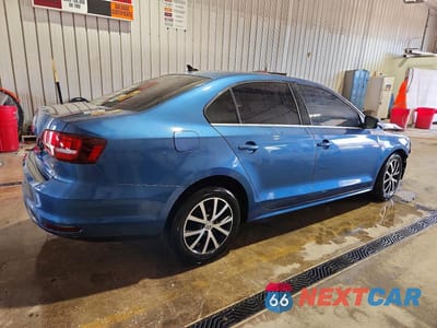 Trzecie zdjęcie samochodu z tyłu: 2017 VOLKSWAGEN JETTA SE VIN:3VWDB7AJ8HM303688 - miniatura