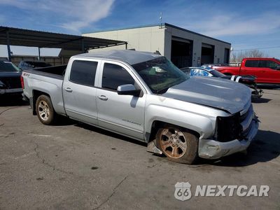 Czwarte zdjęcie samochodu z boku: 2018 CHEVROLET SILVERADO K1500 LT VIN:3GCUKREC3JG456185 - miniatura