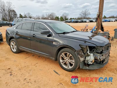 Czwarte zdjęcie samochodu z boku: 2016 FORD TAURUS SE VIN:1FAHP2D83GG139105 - miniatura