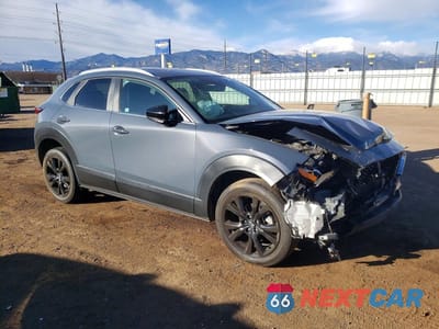 Czwarte zdjęcie samochodu z boku: 2021 MAZDA CX-30 VIN:3MVDMBAYXMM233519 - miniatura