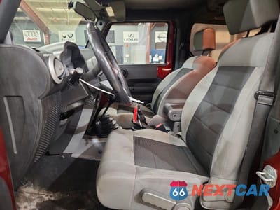 Zdjęcie 7 z 12 samochodu: 2010 JEEP WRANGLER SAHARA VIN:1J4AA5D11AL154583 - miniatura