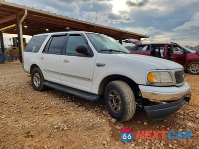 Czwarte zdjęcie samochodu z boku: 2000 FORD EXPEDITION XLT VIN:1FMRU1565YLA60022 - miniatura