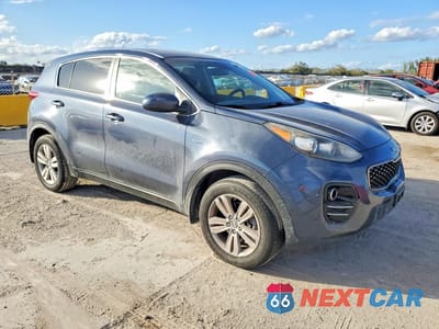 Czwarte zdjęcie samochodu z boku: 2018 KIA SPORTAGE LX VIN:KNDPMCAC0J7449927 - miniatura