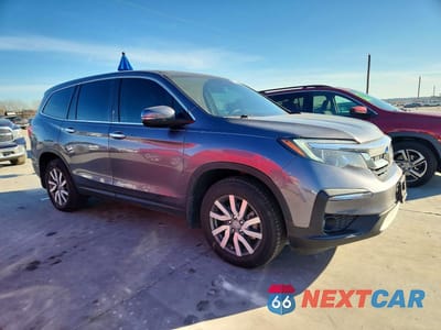 Czwarte zdjęcie samochodu z boku: 2022 HONDA PILOT EXL VIN:5FNYF5H58NB009827 - miniatura