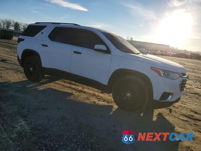 Czwarte zdjęcie samochodu z boku: 2021 CHEVROLET TRAVERSE LT VIN:1GNERGKW3MJ271812 - miniatura