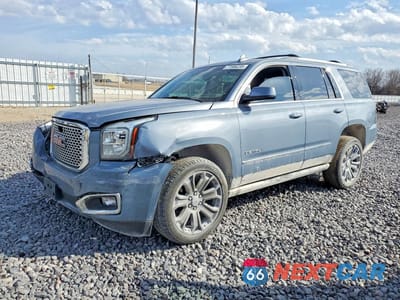 2015 GMC YUKON DENALI 1GKS2CKJ3FR660939 - główne zdjęcie licytacji z USA - miniatura