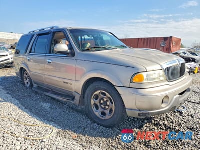Czwarte zdjęcie samochodu z boku: 2001 LINCOLN NAVIGATOR VIN:5LMEU27R41LJ32035 - miniatura